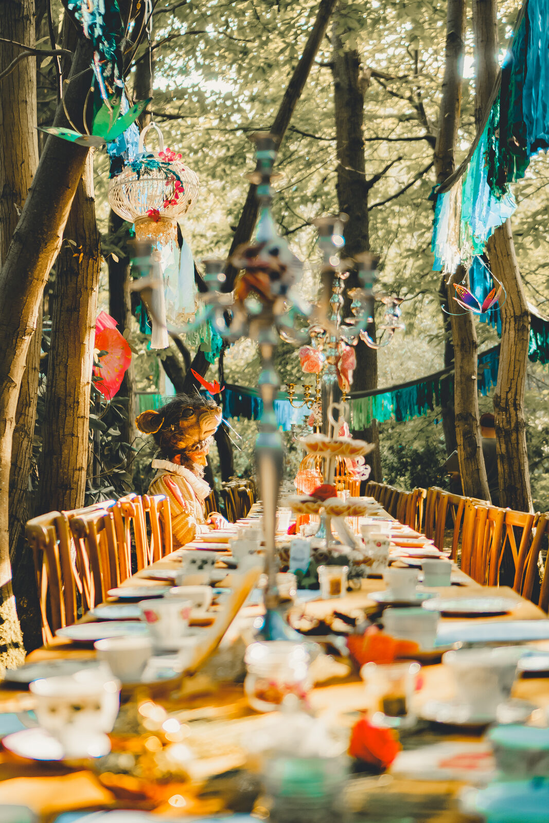 Chalice in Wonderland tea-party long table dressed for ceremony