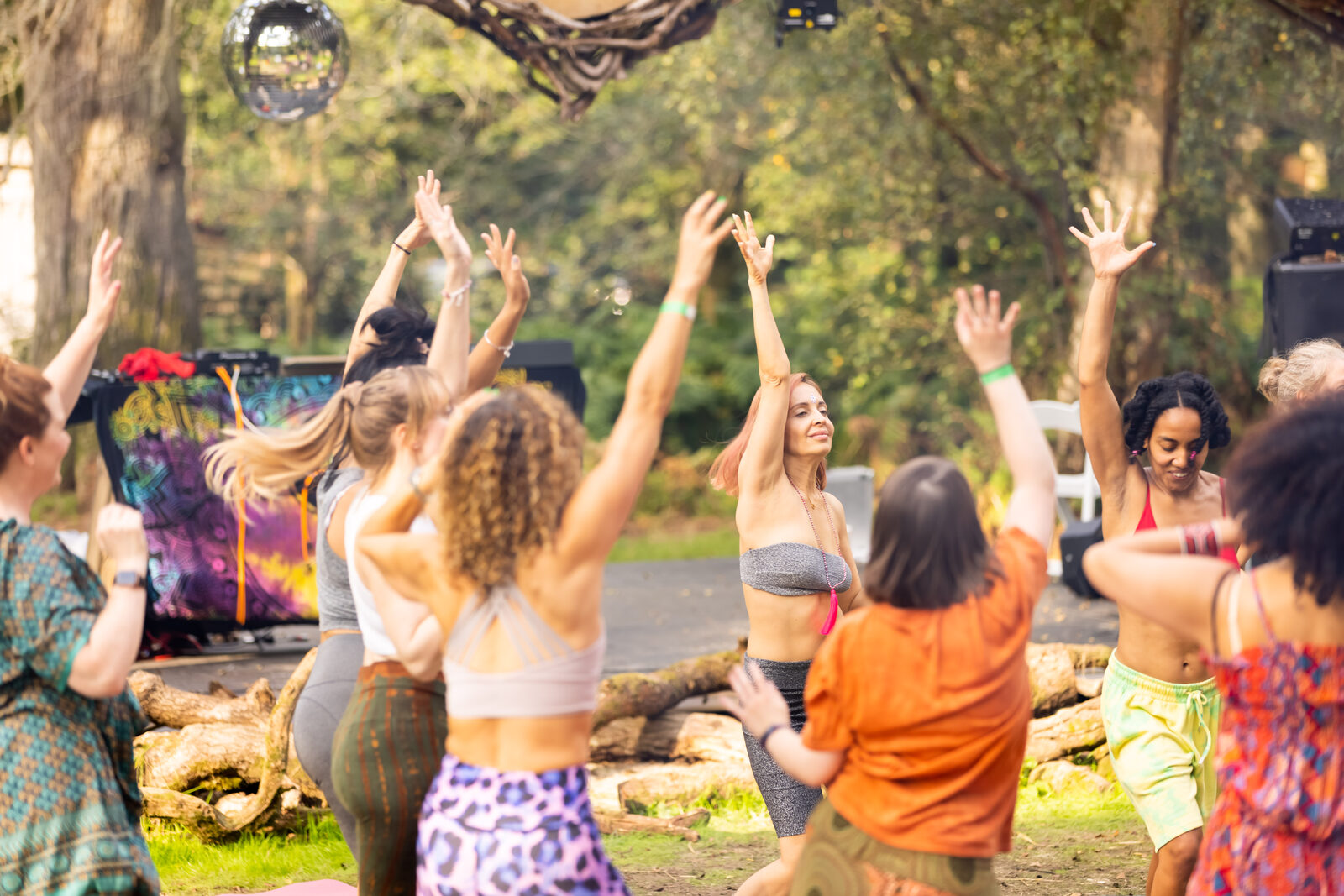 Ecstatic dance circle in the woodland clearing