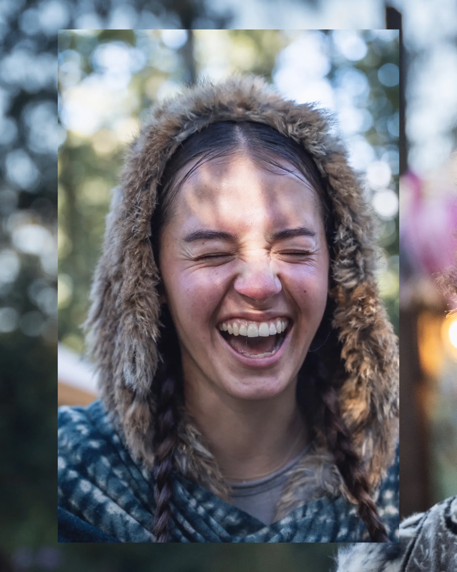 Friend laughing in fur hood