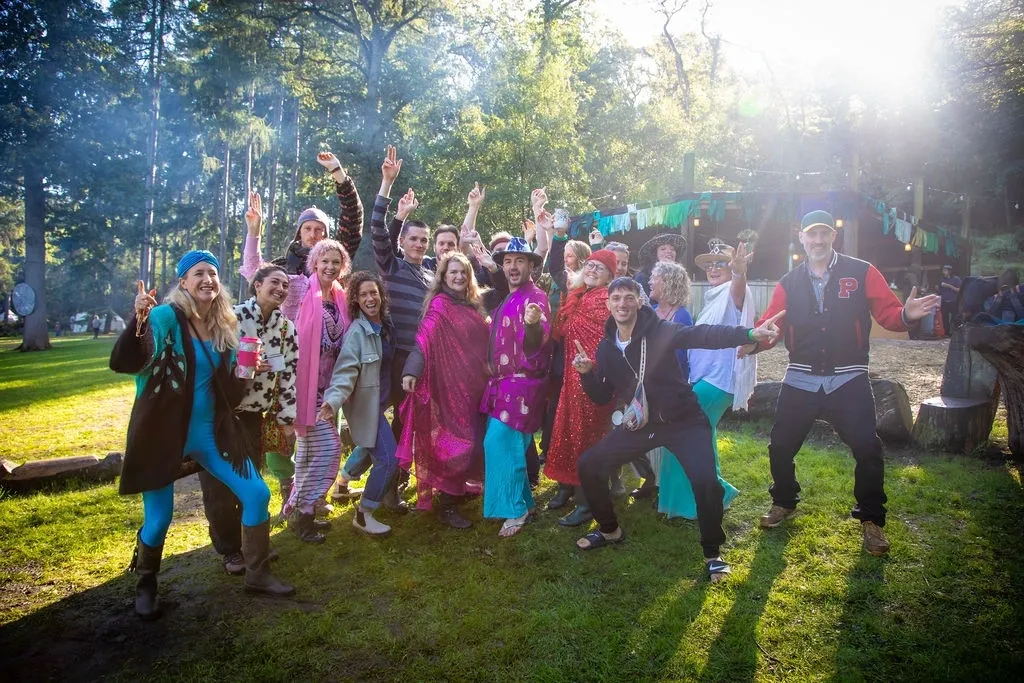 Group cheering in the woods